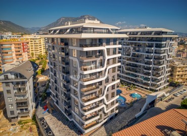 Luxury real estate at the initial stage of construction in the area of Alanya - Tosmur, with interest-free installments ID-10258 фото-4