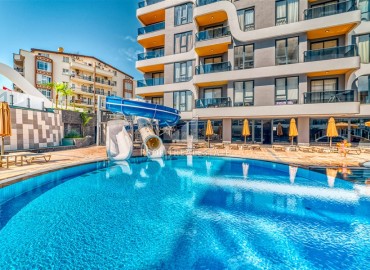 Luxury real estate at the initial stage of construction in the area of Alanya - Tosmur, with interest-free installments ID-10258 фото-6