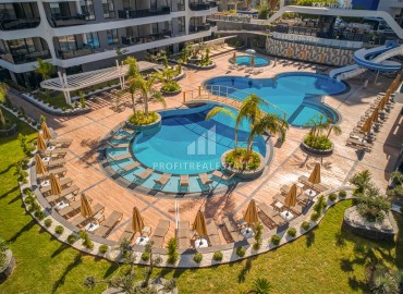 Luxury real estate at the initial stage of construction in the area of Alanya - Tosmur, with interest-free installments ID-10258 фото-9