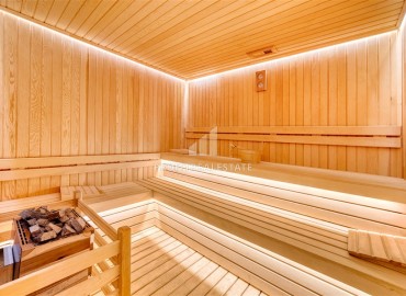 Luxury real estate at the initial stage of construction in the area of Alanya - Tosmur, with interest-free installments ID-10258 фото-13