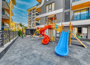 Luxury real estate at the initial stage of construction in the area of Alanya - Tosmur, with interest-free installments ID-10258 фото-17