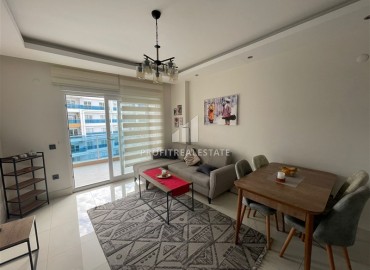 Стильная квартира с одной спальней, 65м², с потрясающим видом на море в элитном комплексе в районе Алании - Тосмур ID-18735 фото-2