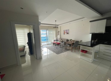 Стильная квартира с одной спальней, 65м², с потрясающим видом на море в элитном комплексе в районе Алании - Тосмур ID-18735 фото-4