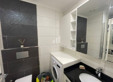 Стильная квартира с одной спальней, 65м², с потрясающим видом на море в элитном комплексе в районе Алании - Тосмур ID-18735 фото-9