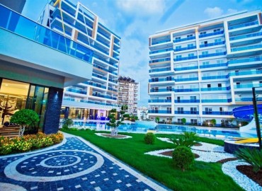 Стильная квартира с одной спальней, 65м², с потрясающим видом на море в элитном комплексе в районе Алании - Тосмур ID-18735 фото-15