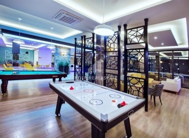 Стильная квартира с одной спальней, 65м², с потрясающим видом на море в элитном комплексе в районе Алании - Тосмур ID-18735 фото-16