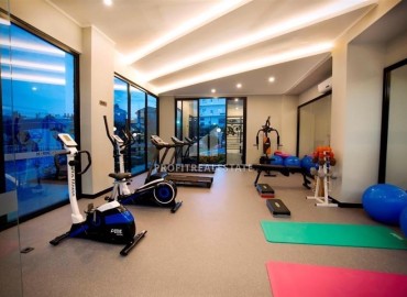 Стильная квартира с одной спальней, 65м², с потрясающим видом на море в элитном комплексе в районе Алании - Тосмур ID-18735 фото-17