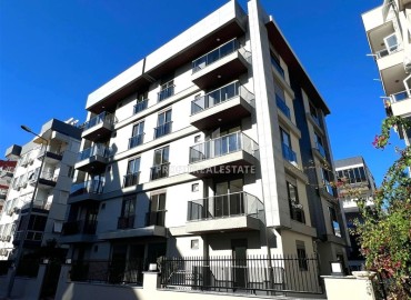 Новая недвижимость в Анталии: двухкомнатная квартира, 55м², в доме с парковкой в районе Муратпаша ID-18737 фото-1