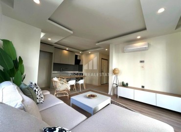 Новая недвижимость в Анталии: двухкомнатная квартира, 55м², в доме с парковкой в районе Муратпаша ID-18737 фото-2