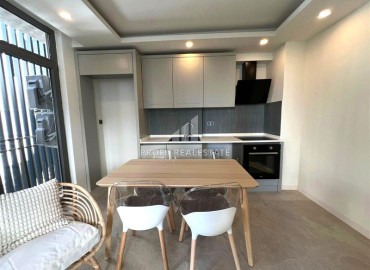 Новая недвижимость в Анталии: двухкомнатная квартира, 55м², в доме с парковкой в районе Муратпаша ID-18737 фото-4