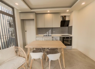 Новая недвижимость в Анталии: двухкомнатная квартира, 55м², в доме с парковкой в районе Муратпаша ID-18737 фото-6