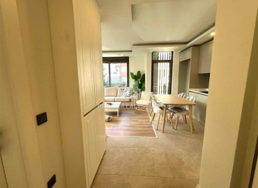 Новая недвижимость в Анталии: двухкомнатная квартира, 55м², в доме с парковкой в районе Муратпаша ID-18737 фото-9