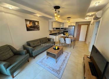 Элегантные апартаменты с одной спальней, 75м², в комплексе с обширной инфраструктурой в Джикджилли, Алания ID-18739 фото-2