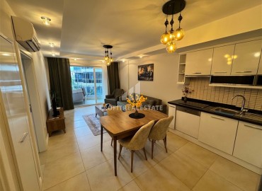 Элегантные апартаменты с одной спальней, 75м², в комплексе с обширной инфраструктурой в Джикджилли, Алания ID-18739 фото-3