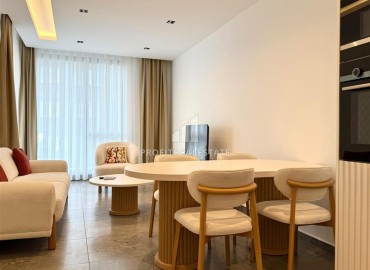 Двухкомнатная квартира, 65м², с бытовой техникой в элегантной резиденции на первой береговой линии в Каргыджаке, Алания ID-17190 фото-3