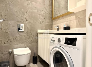 Двухкомнатная квартира, 65м², с бытовой техникой в элегантной резиденции на первой береговой линии в Каргыджаке, Алания ID-17190 фото-9