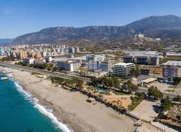 Двухкомнатная квартира, 65м², с бытовой техникой в элегантной резиденции на первой береговой линии в Каргыджаке, Алания ID-17190 фото-16