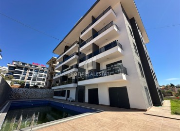 Квартира с одной спальней, 48м², с видом на горы в новой резиденции с инфраструктурой в районе Оба, Алания ID-18741 фото-1