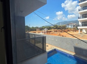 Квартира с одной спальней, 48м², с видом на горы в новой резиденции с инфраструктурой в районе Оба, Алания ID-18741 фото-16