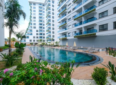 Двухкомнатные апартаменты, 60м², с чистовой отделкой в элитном новом комплексе в районе Махмутлар, Алания ID-18748 фото-1