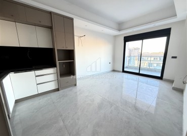 Двухкомнатные апартаменты, 60м², с чистовой отделкой в элитном новом комплексе в районе Махмутлар, Алания ID-18748 фото-5