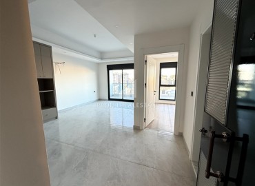 Двухкомнатные апартаменты, 60м², с чистовой отделкой в элитном новом комплексе в районе Махмутлар, Алания ID-18748 фото-7