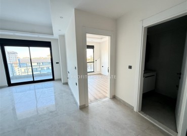 Двухкомнатные апартаменты, 60м², с чистовой отделкой в элитном новом комплексе в районе Махмутлар, Алания ID-18748 фото-8