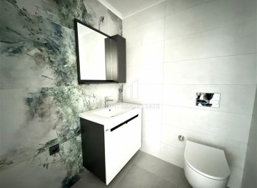 Двухкомнатные апартаменты, 60м², с чистовой отделкой в элитном новом комплексе в районе Махмутлар, Алания ID-18748 фото-9