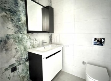 Двухкомнатные апартаменты, 60м², с чистовой отделкой в элитном новом комплексе в районе Махмутлар, Алания ID-18748 фото-11