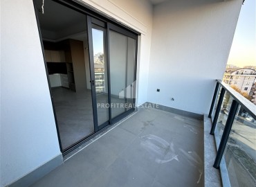 Двухкомнатные апартаменты, 60м², с чистовой отделкой в элитном новом комплексе в районе Махмутлар, Алания ID-18748 фото-16