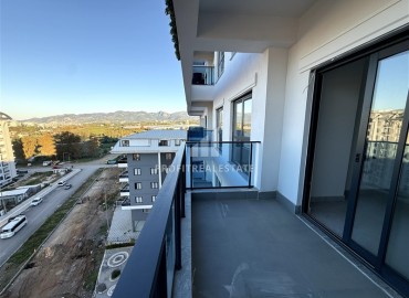 Двухкомнатные апартаменты, 60м², с чистовой отделкой в элитном новом комплексе в районе Махмутлар, Алания ID-18748 фото-17