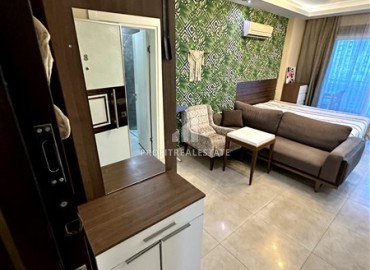 Уютная меблированная студия 0+1, 41м², в резиденции с инфраструктурой пятизвездочного отеля в 500м от моря в Махмутларе, Алания ID-18750 фото-3
