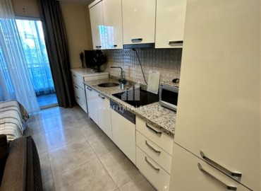 Уютная меблированная студия 0+1, 41м², в резиденции с инфраструктурой пятизвездочного отеля в 500м от моря в Махмутларе, Алания ID-18750 фото-5