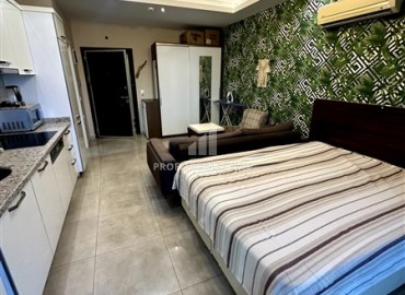 Уютная меблированная студия 0+1, 41м², в резиденции с инфраструктурой пятизвездочного отеля в 500м от моря в Махмутларе, Алания ID-18750 фото-9