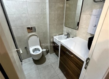 Уютная меблированная студия 0+1, 41м², в резиденции с инфраструктурой пятизвездочного отеля в 500м от моря в Махмутларе, Алания ID-18750 фото-12