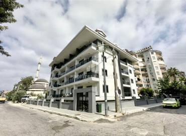 Комфортабельная недвижимость в центре Алании у пляжа Клеопатры: квартира с одной спальней, 68м², в новом комплексе ID-18757 фото-1