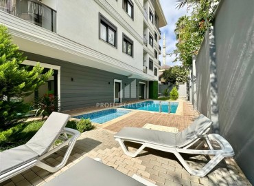 Комфортабельная недвижимость в центре Алании у пляжа Клеопатры: квартира с одной спальней, 68м², в новом комплексе ID-18757 фото-11