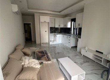 Квартира с одной спальней, 55м², в комплексе с зимним бассейном в 650м от моря в районе Махмутлар, Алания ID-18760 фото-2
