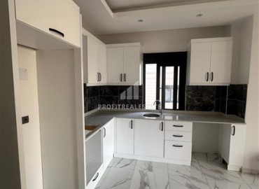 Квартира с одной спальней, 55м², в комплексе с зимним бассейном в 650м от моря в районе Махмутлар, Алания ID-18760 фото-3
