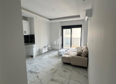 Квартира с одной спальней, 55м², в комплексе с зимним бассейном в 650м от моря в районе Махмутлар, Алания ID-18760 фото-4