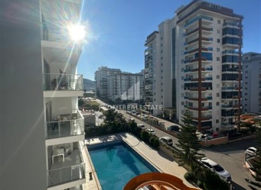 Квартира с одной спальней, 55м², в комплексе с зимним бассейном в 650м от моря в районе Махмутлар, Алания ID-18760 фото-9