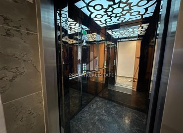 Квартира с одной спальней, 55м², в комплексе с зимним бассейном в 650м от моря в районе Махмутлар, Алания ID-18760 фото-13