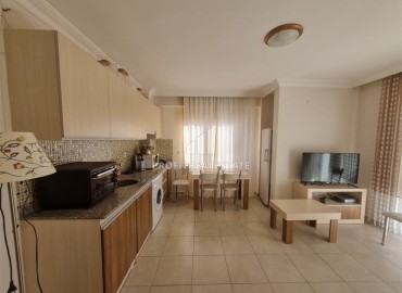 Недвижимость в 200 метрах от моря: меблированная квартира с одной спальней, 50м² в Махмутларе, Алания ID-18762 фото-2