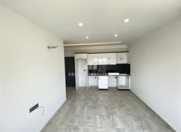 Новая двухкомнатная квартира, 50м², с чистовой отделкой в комплексе с бассейном в Авсалларе, Алания ID-18764 фото-2