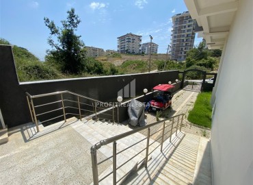 Новая двухкомнатная квартира, 50м², с чистовой отделкой в комплексе с бассейном в Авсалларе, Алания ID-18764 фото-9