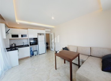 Новая меблированная двухкомнатная квартира, 54м², в комфортабельном комплексе в районе Тосмур, Алания ID-18771 фото-2