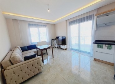 Новая меблированная двухкомнатная квартира, 54м², в комфортабельном комплексе в районе Тосмур, Алания ID-18771 фото-3