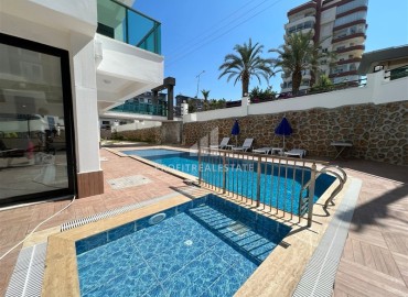 Новая меблированная двухкомнатная квартира, 54м², в комфортабельном комплексе в районе Тосмур, Алания ID-18771 фото-12