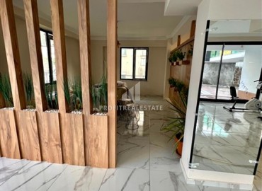 Новая меблированная двухкомнатная квартира, 54м², в комфортабельном комплексе в районе Тосмур, Алания ID-18771 фото-13