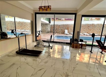 Новая меблированная двухкомнатная квартира, 54м², в комфортабельном комплексе в районе Тосмур, Алания ID-18771 фото-14